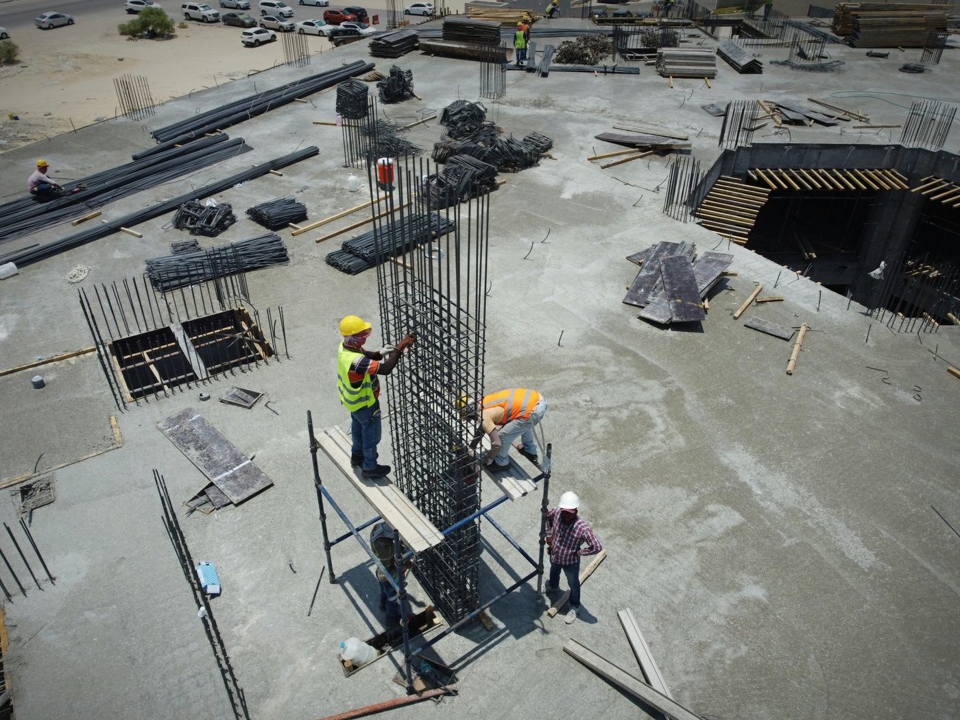 Construction team working on a concrete deck